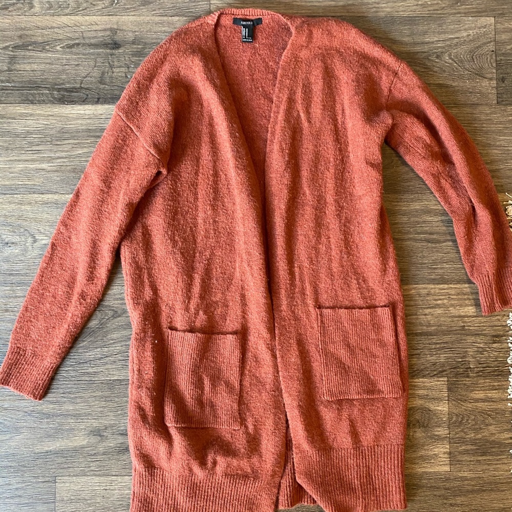 Long burnt-orange cardigan